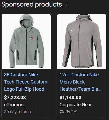 A screenshot of the sponsored products section for a Google Shopping search. Displaying two Nike reseller jackets. 